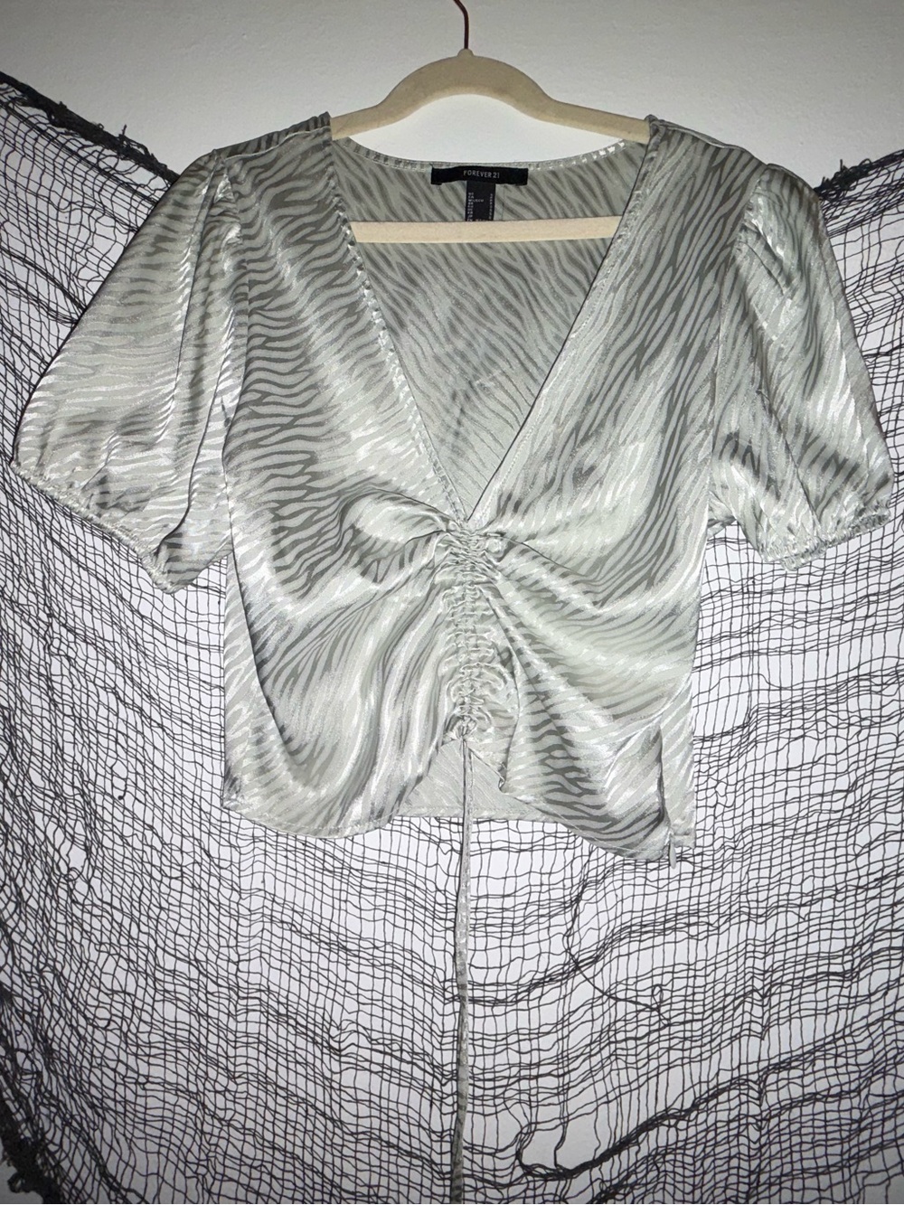 A really good vacation top with adjustable middle and a side zipper